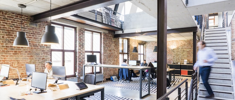 A modern open-plan workspace seen end to end