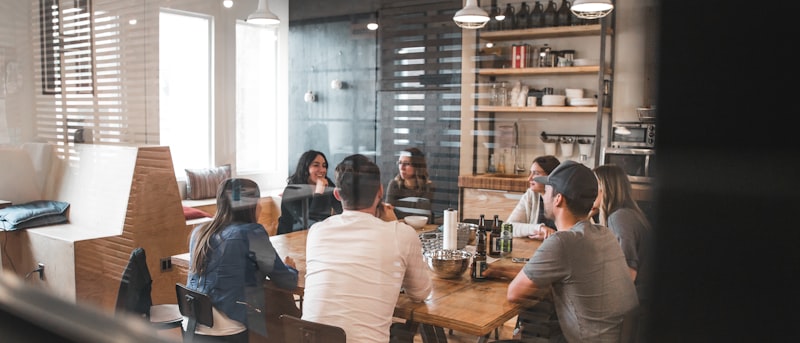 A small startup team working together around one desk